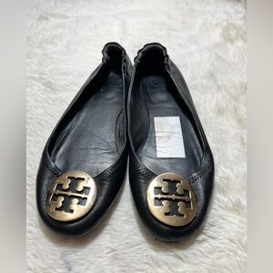 Tory Burch Black and Gold Flats with Signature Logo